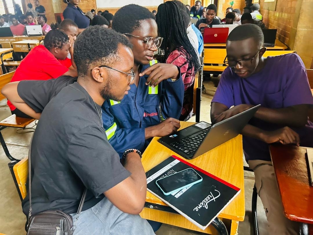 Students in a library using reference materials